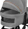 Close-up view of a gray baby stroller with a mesh window and a brown trim on the canopy. Anteprima dell’immagine prodotto