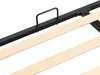 A close-up view of a bed frame's wooden slats and metal support structure. Voir les images du produit