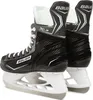 A pair of black Bauer ice skates with white laces and accents, shown from a side-angle. Produktbild-Vorschau