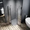 A modern bathroom with a glass shower enclosure, a freestanding bathtub, and wooden flooring. Anteprima dell’immagine prodotto