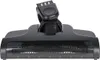 A close-up studio shot of a black vacuum cleaner floor head with a brush roll visible through a clear plastic cover. Produktbild-Vorschau