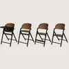 Four identical high chairs are displayed side-by-side against a plain background. The leftmost chair is equipped with a tray, while the others are not. Voir les images du produit