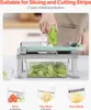 A person is using a mandoline slicer to cut a cucumber, with sliced cucumbers in a container below. Three different blade specifications are shown at the bottom. Produktbild-Vorschau