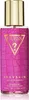 A pink bottle of Guess Sexy Skin Wild Flower fragrance mist with a gold cap. Anteprima dell’immagine prodotto