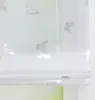 A close-up view of a white Roman blind with a subtle butterfly pattern. Produktbild-Vorschau
