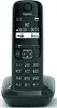 A black Gigaset cordless phone is shown in its charging base against a white background. Voir les images du produit