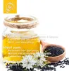 A jar of oil with black seeds and flowers, surrounded by text providing usage suggestions. Produktbild-Vorschau