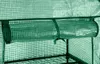 Close-up view of a rolled-up greenhouse film inside a greenhouse structure. Anteprima dell’immagine prodotto
