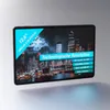A tablet displaying a city skyline at night with marketing text. Produktbild-Vorschau