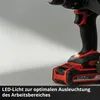 Close-up of a cordless drill with an LED light illuminating the work area. Produktbild-Vorschau