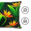A close-up of a pillow with a tropical bird of paradise flower pattern, next to two circular icons indicating product features. Produktbild-Vorschau