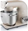 A beige and silver stand mixer is shown from a slight diagonal angle against a white background. Anteprima dell’immagine prodotto