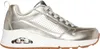 A side view of a single gold Skechers sneaker against a white background. Voir les images du produit