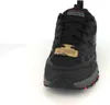 A black Skechers trail shoe is shown from the front on a white background. Produktbild-Vorschau