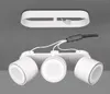 A white ceiling light fixture with three adjustable spotlights is shown against a gray background, with its mounting bracket and wiring visible. Produktbild-Vorschau