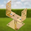 A metal post support bracket is shown in a close-up shot against a blurred background of green grass and a blue sky. Anteprima dell’immagine prodotto