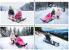 A collage of four images showing children using a sled in a snowy environment. Anteprima dell’immagine prodotto