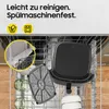 Inside a dishwasher, showing parts of an air fryer being cleaned. Produktbild-Vorschau