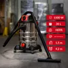 A wet and dry vacuum cleaner is shown in a warehouse-like setting with promotional text on the right side. Náhľad obrázku produktu
