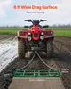 A red ATV is dragging a green land leveling tool through a muddy field. Produktbild-Vorschau