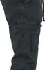 A close-up view of the side of black cargo pants, showing the pocket detail. Anteprima dell’immagine prodotto
