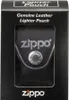 A black Zippo lighter pouch is shown inside its black packaging. Podgląd zdjęcia produktu