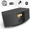 A black digital radio with a screen displaying album art and song information, set against a white background. Produktbild-Vorschau