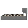A side view of a gray upholstered bed frame with a slatted mattress support. Náhled obrázku produktu