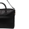 A close-up view of a black bag with a strap. Produktbild-Vorschau