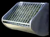 A close-up view of a hay feeder for animals, filled with hay. Anteprima dell’immagine prodotto