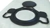 A black vacuum cleaner filter bag and its components are laid out on a white textured surface. Anteprima dell’immagine prodotto