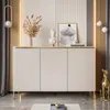 A modern living room with a beige sideboard, decorative items, and ambient lighting. Produktbild-Vorschau