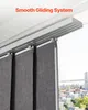 Close-up of a smooth gliding system for vertical blinds, showing the track and the fabric panels. Podgląd zdjęcia produktu