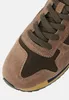 A close-up view of the toe area of a sneaker. Produktbild-Vorschau