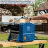 A person is using a blue and gray woodworking planer machine outdoors on a wooden workbench. Produktbild-Vorschau