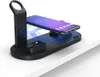 A black 4-in-1 wireless charging station with a smartphone and an Apple Watch charger. Produktbild-Vorschau