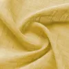 A close-up shot of yellow fabric with a subtle grid pattern, draped and folded. Voir les images du produit