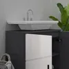 A bathroom vanity with a sink and faucet. Produktbild-Vorschau