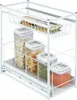A white sliding storage organizer with multiple shelves and containers filled with food items. Anteprima dell’immagine prodotto