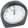 A black Technoline WT 758 radio-controlled alarm clock with a white face and black numbers is shown against a white background. Náhľad obrázku produktu