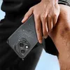 A hand holding a black phone case with water droplets on it, next to a wet leg. Produktbild-Vorschau