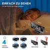 A young person sleeping in bed next to a projection alarm clock, with various feature illustrations below. Náhled obrázku produktu