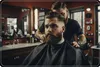 A barber is cutting a customer's hair in a barber shop. Náhled obrázku produktu