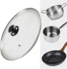 A collage of cookware items including a glass lid, a small saucepan, a pot, and a frying pan. Podgląd zdjęcia produktu