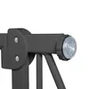 A close-up view of a dark gray metal gate with a clear plastic adjustable foot. Náhled obrázku produktu
