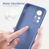 A hand is touching a blue phone case, highlighting its matte surface and soft grip. Produktbild-Vorschau
