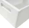 A close-up view of a white wooden box with handles, shown from a diagonal angle. Produktbild-Vorschau