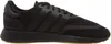 A side view of a black Adidas sneaker. Produktbild-Vorschau