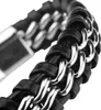 A close-up shot of a black leather bracelet with silver chain links. Produktbild-Vorschau