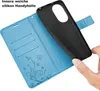 A hand is holding a black phone case over an open blue wallet-style phone case with card slots and a butterfly design. Produktbild-Vorschau